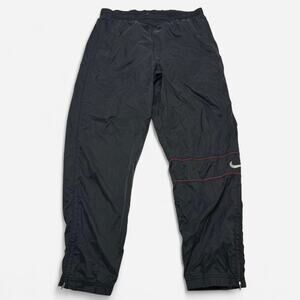 Nike Black Swoosh Track Pants Men’s Size L Windbreaker Athletic Nylon